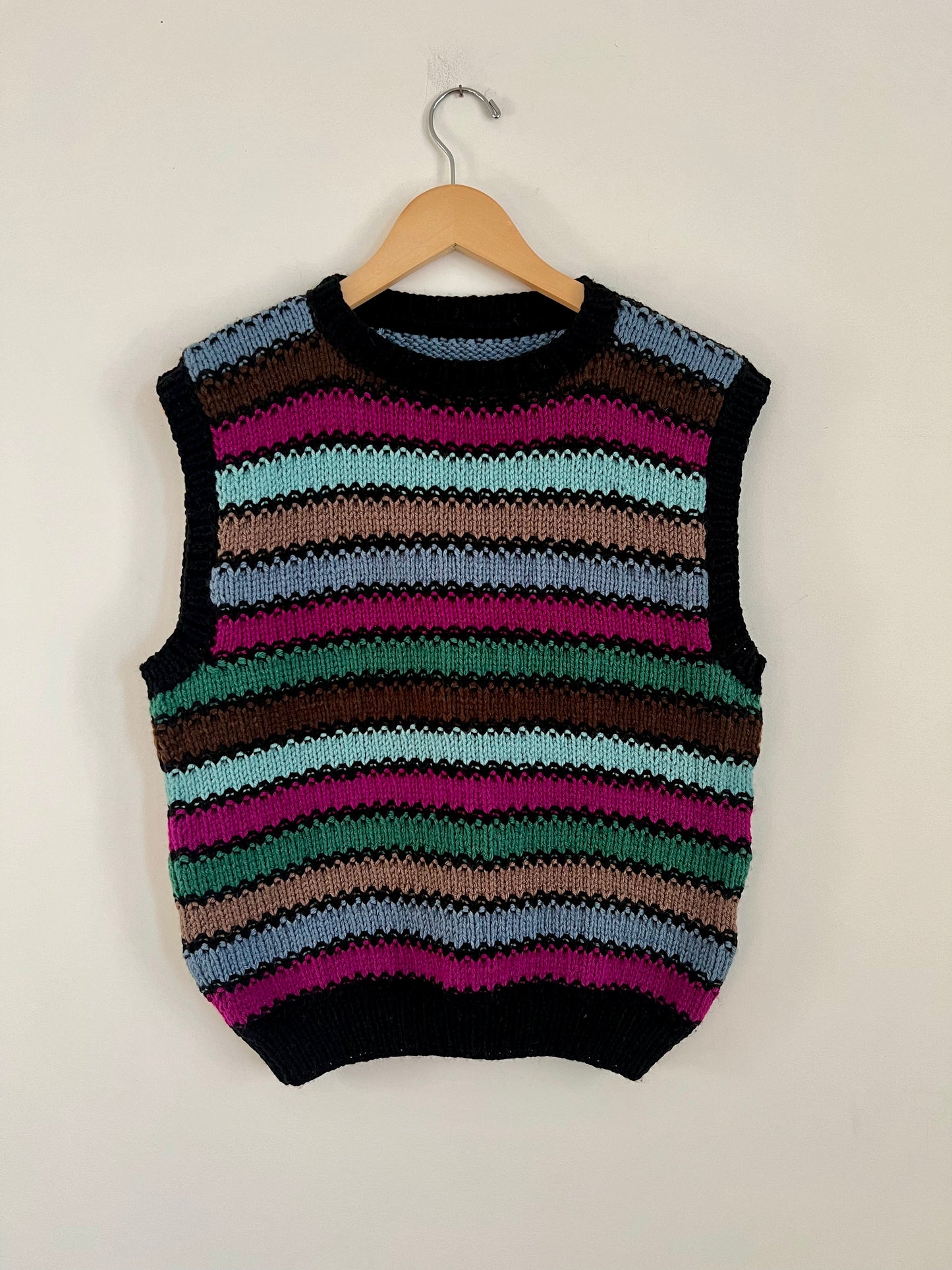 Hand knit vests by Upcycle