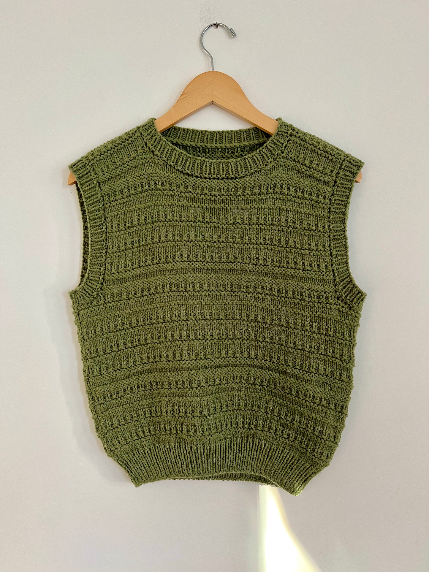 Hand knit vests by Upcycle