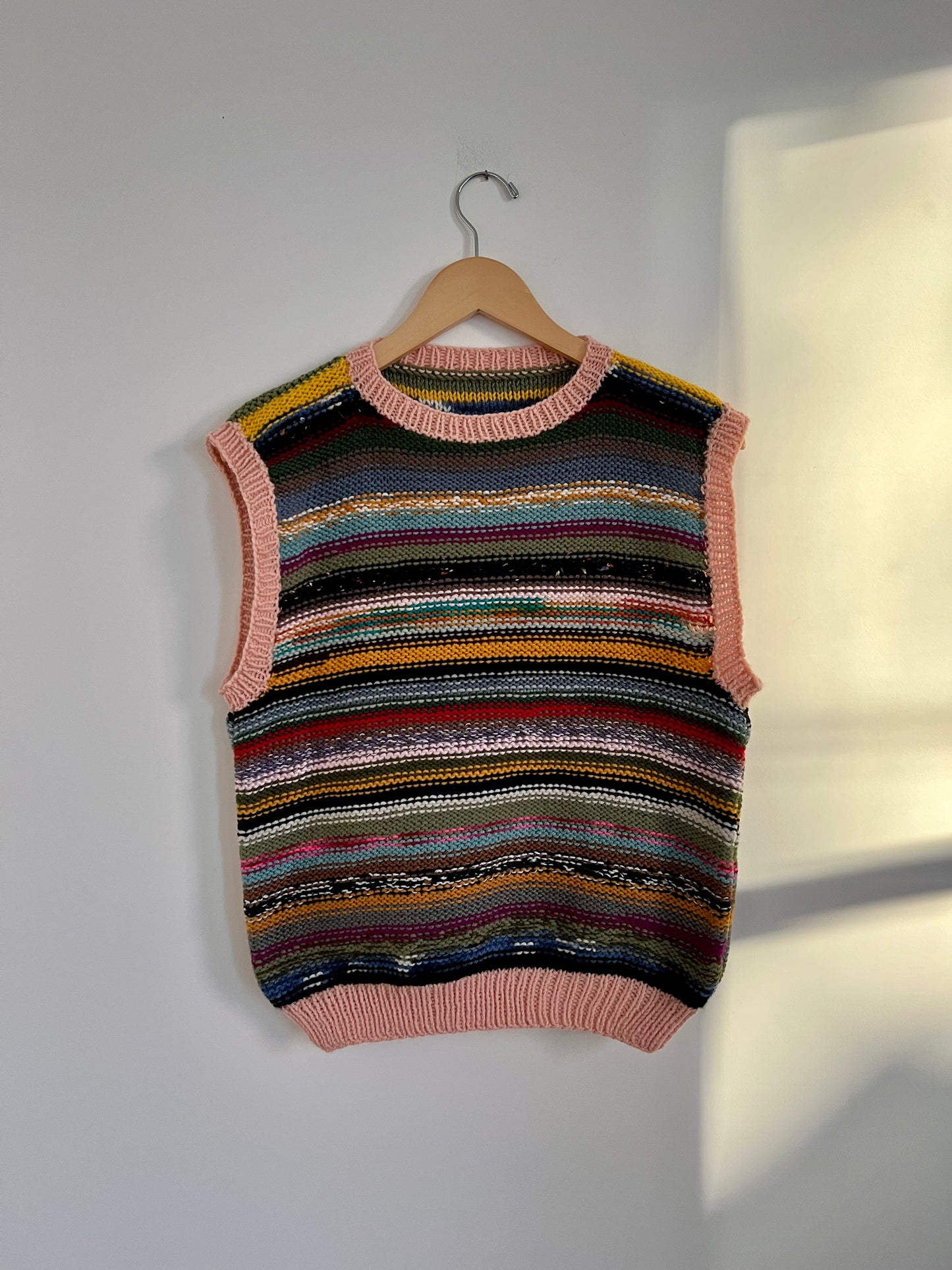 Hand knit vests by Upcycle