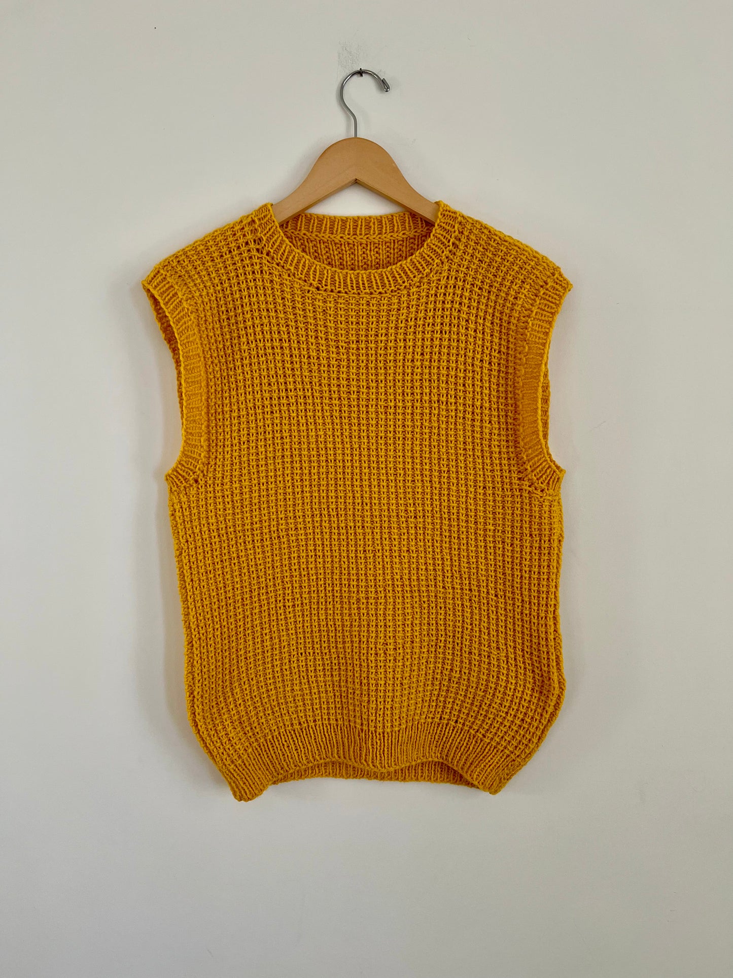 Hand knit vests by Upcycle