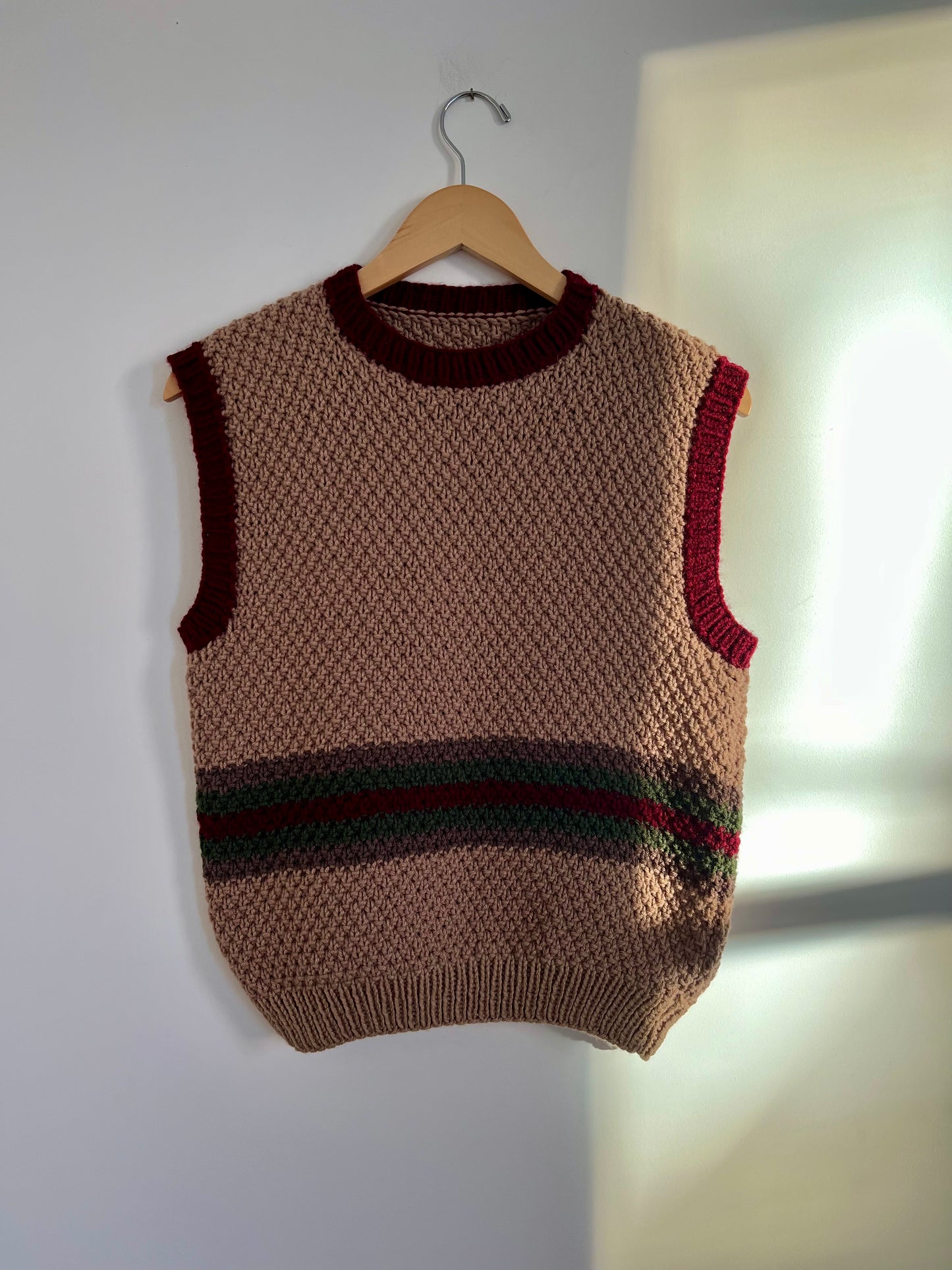 Hand knit vests by Upcycle