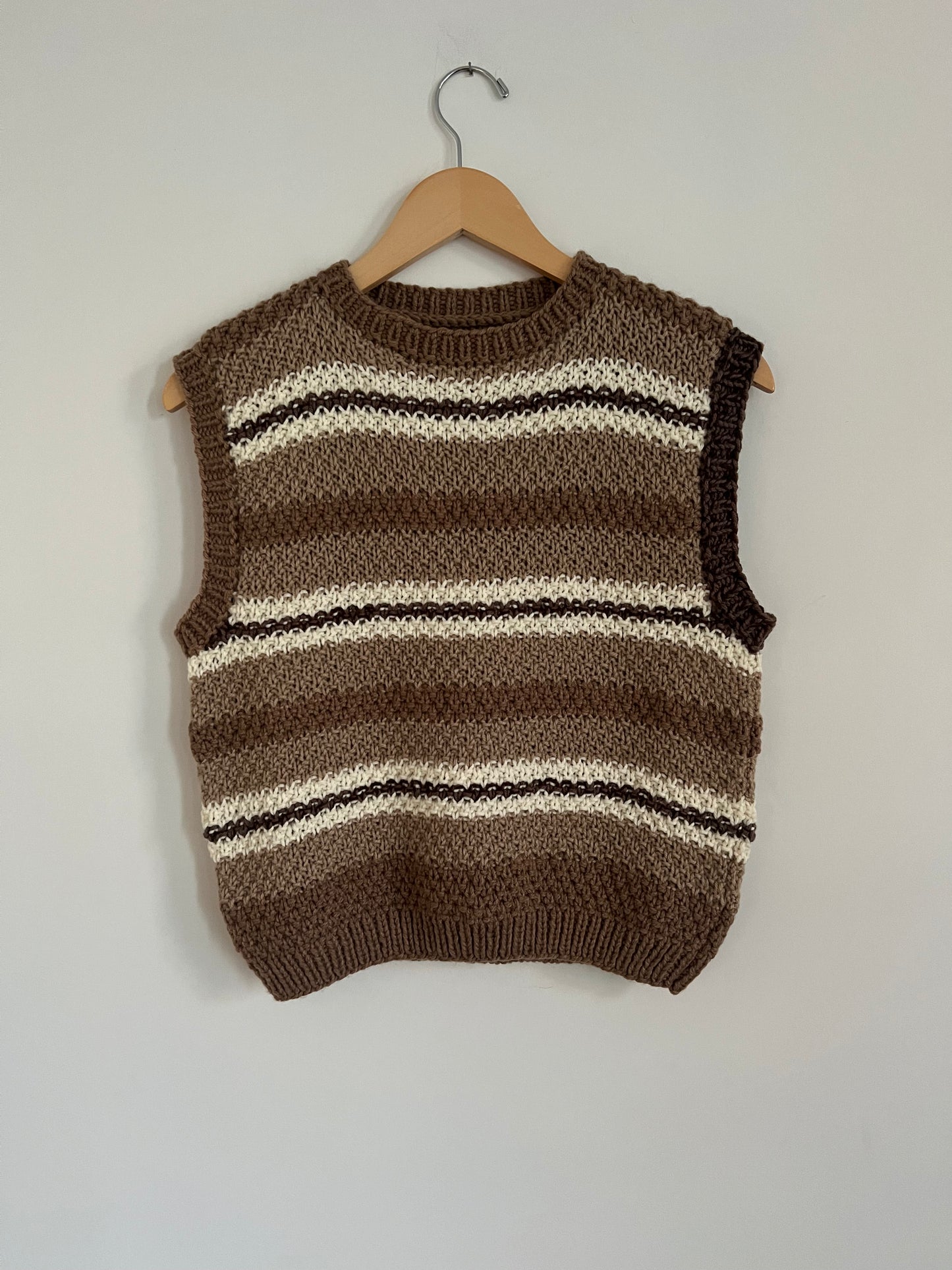 Hand knit vests by Upcycle