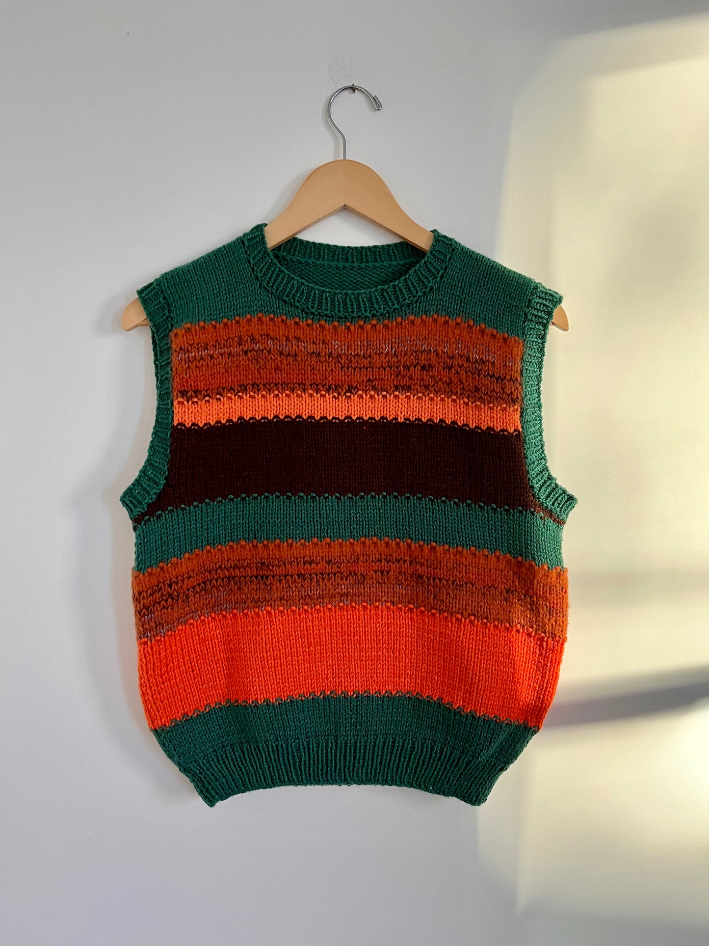 Hand knit vests by Upcycle