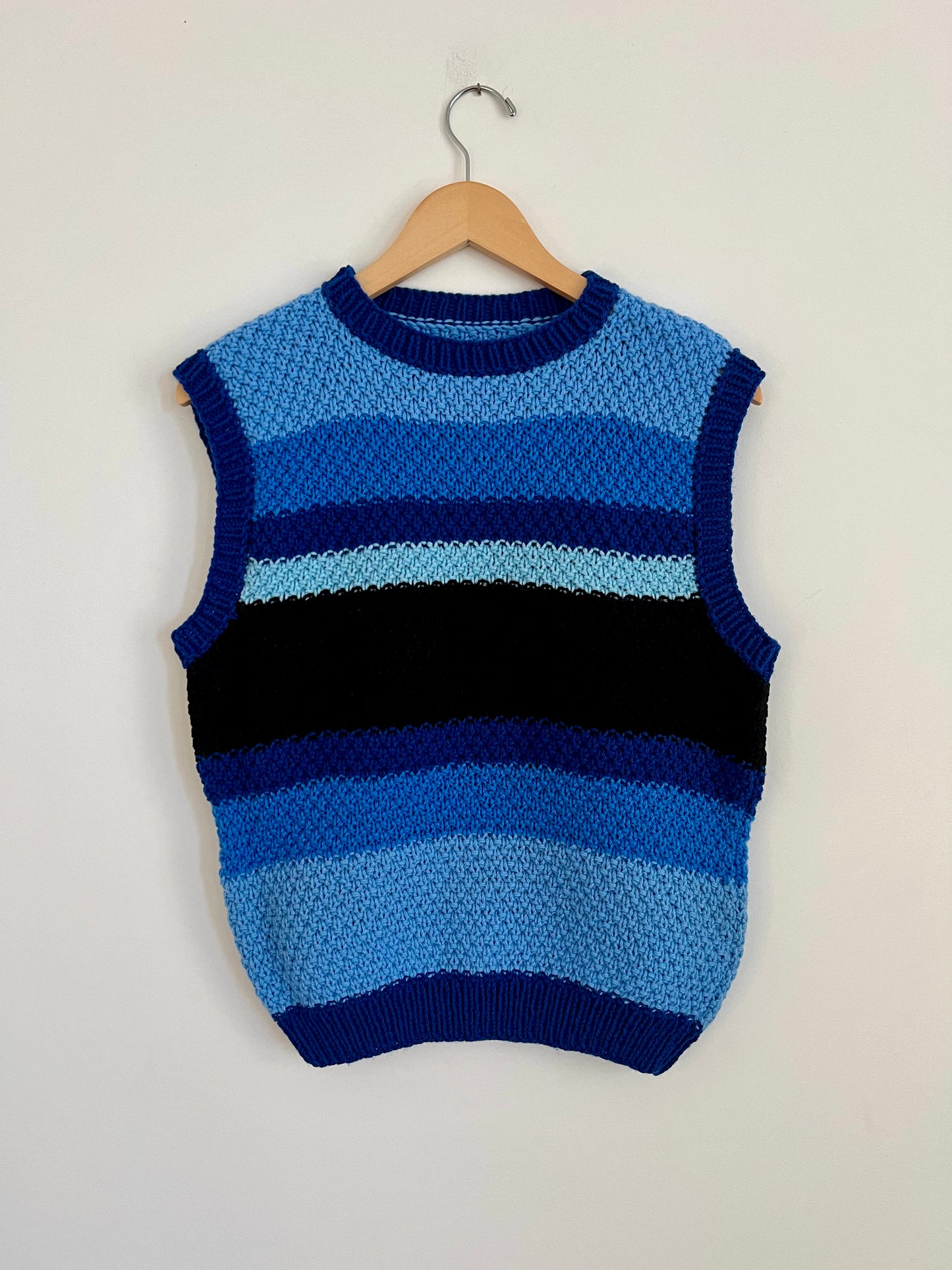 Hand knit vests by Upcycle