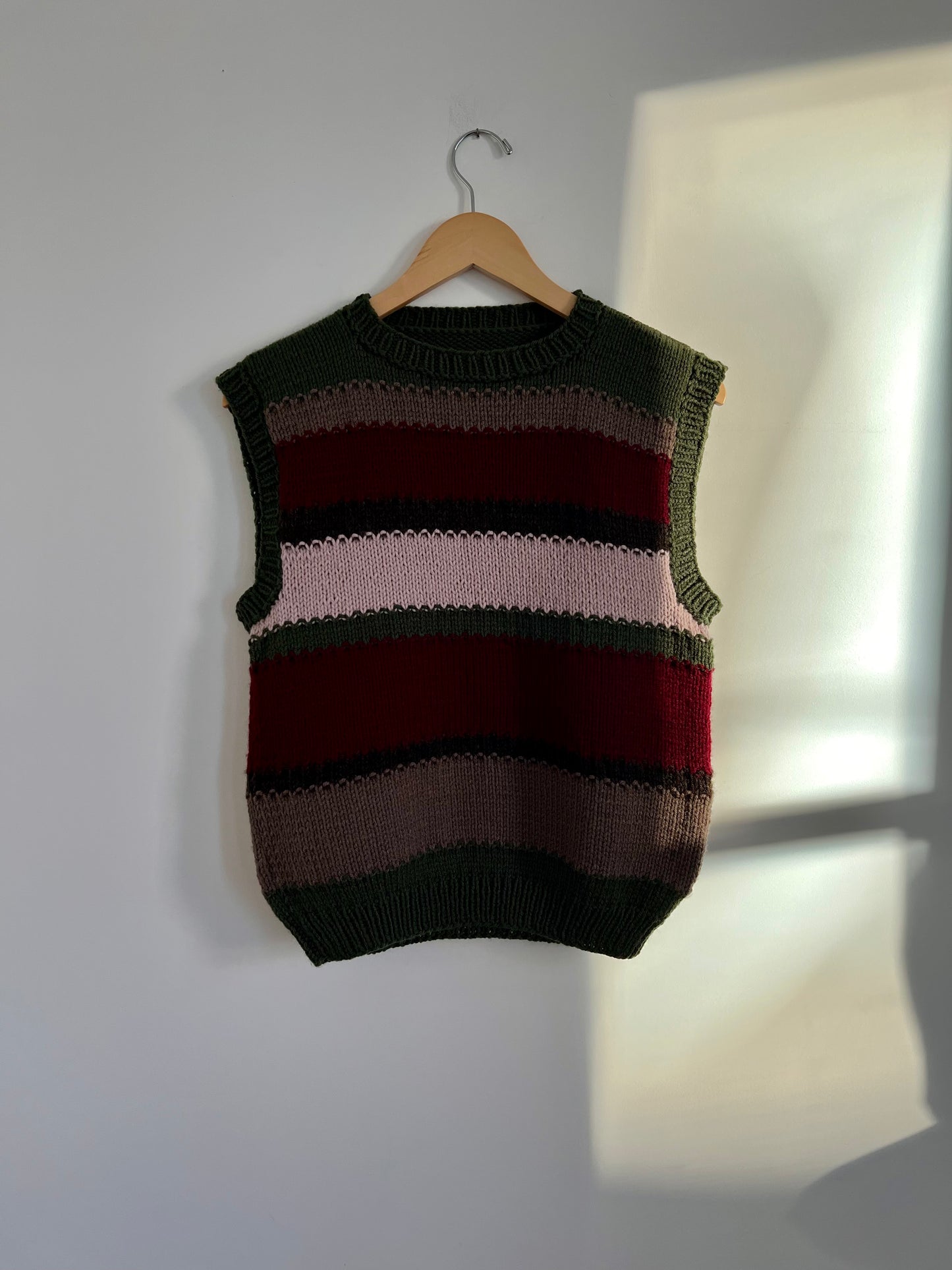 Hand knit vests by Upcycle