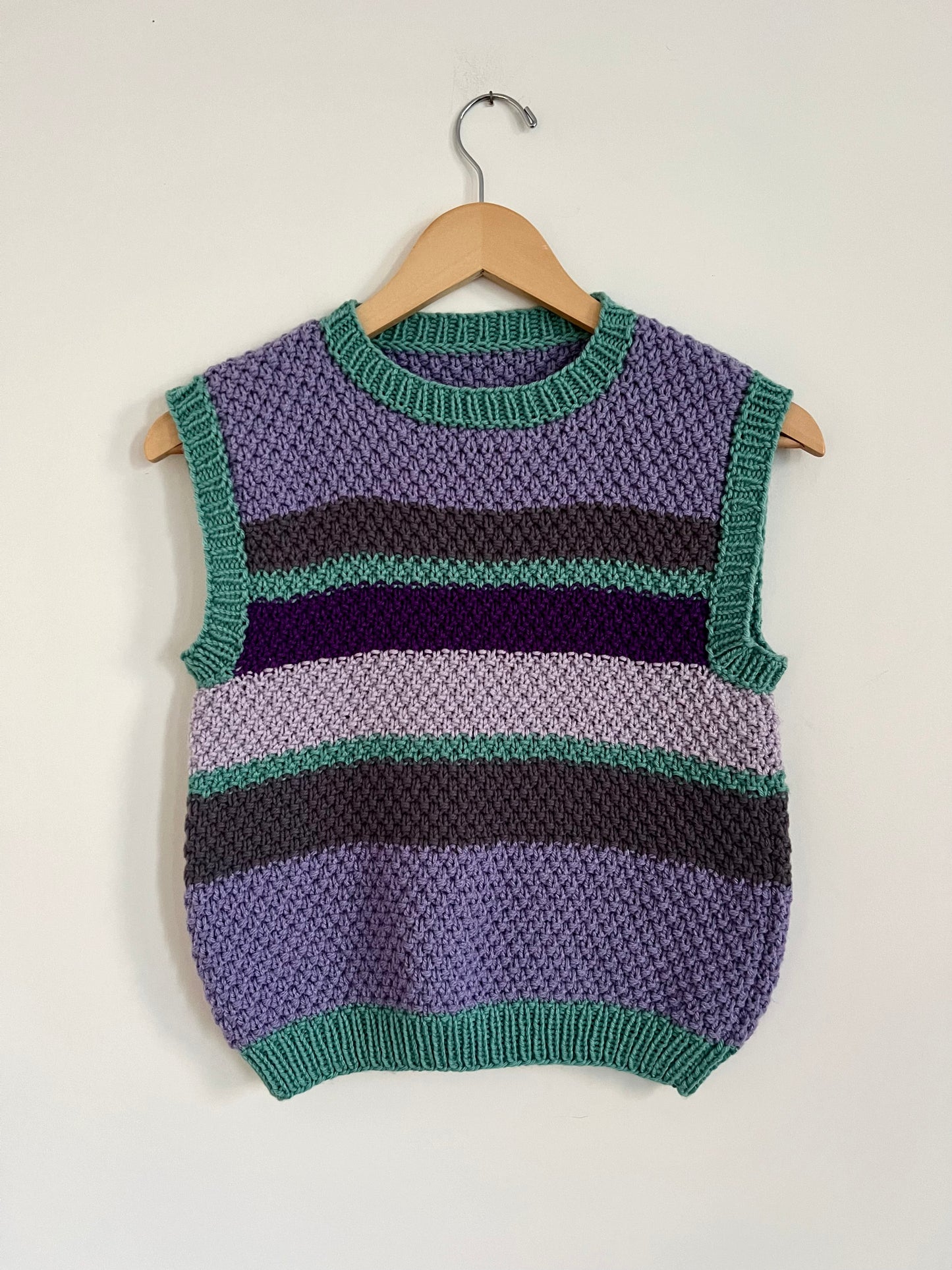 Hand knit vests by Upcycle