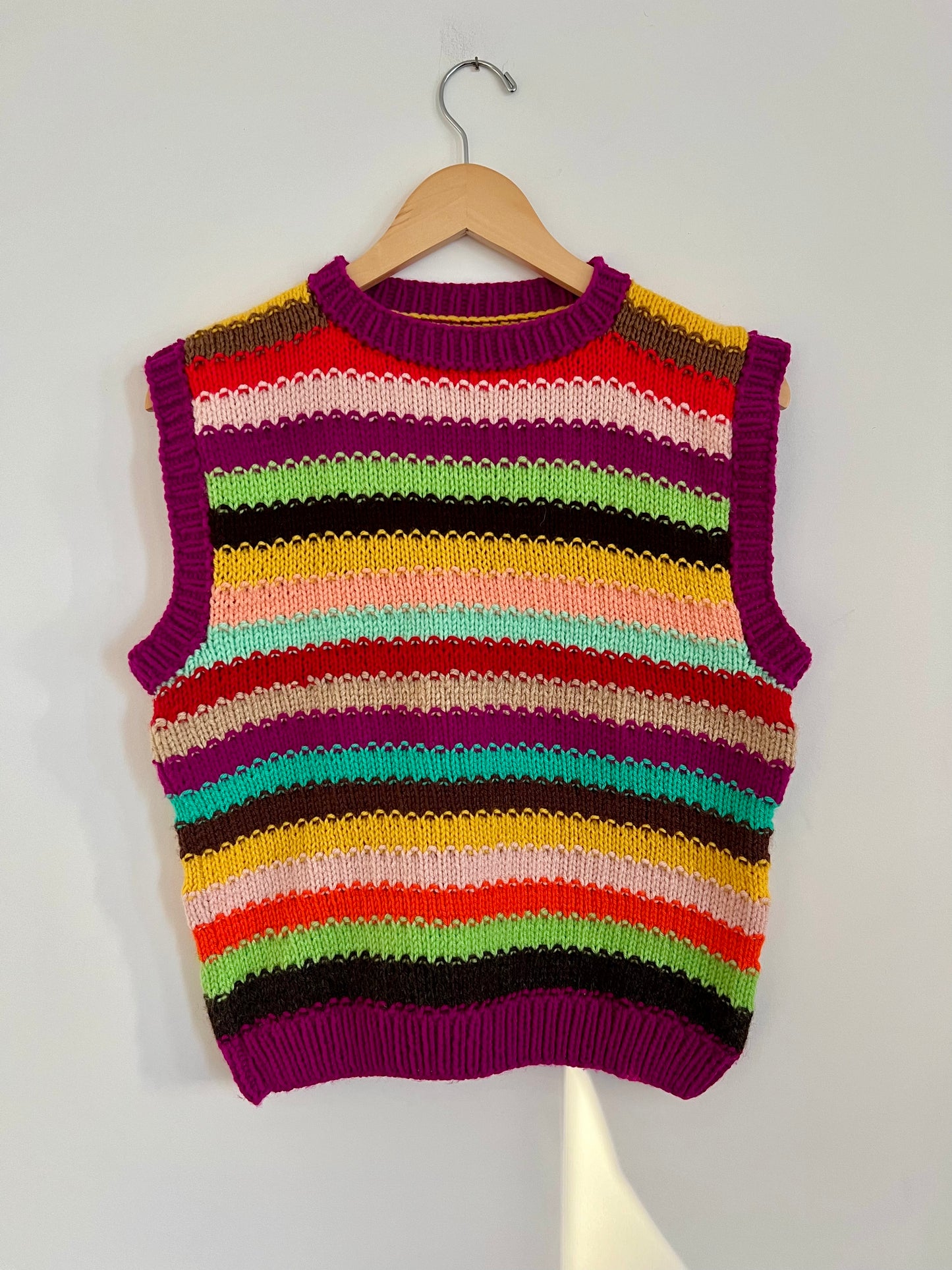 Hand knit vests by Upcycle