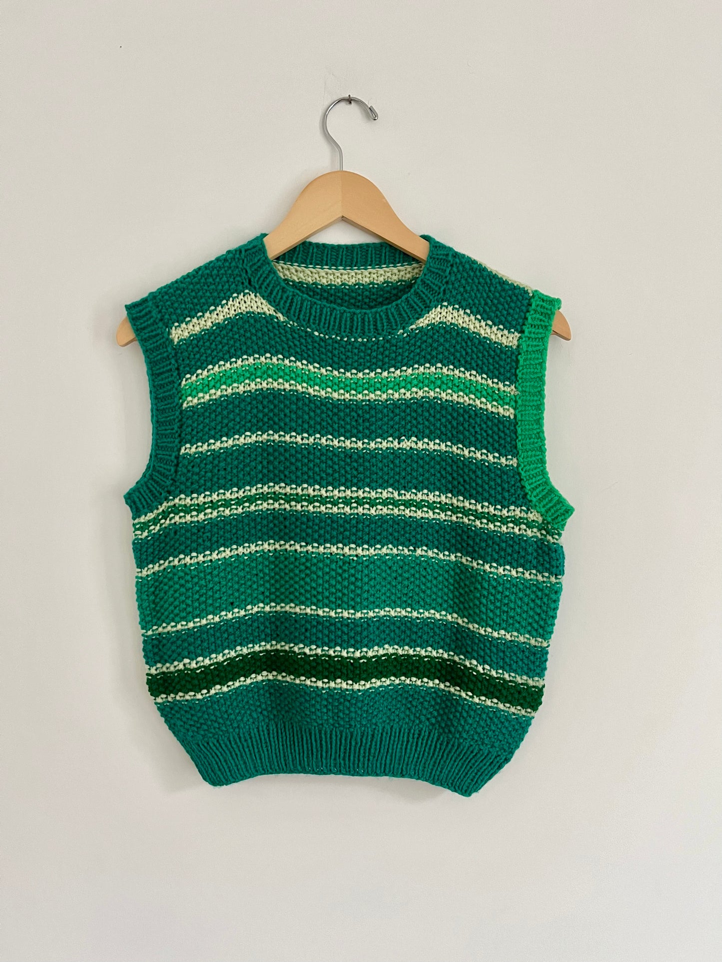 Hand knit vests by Upcycle