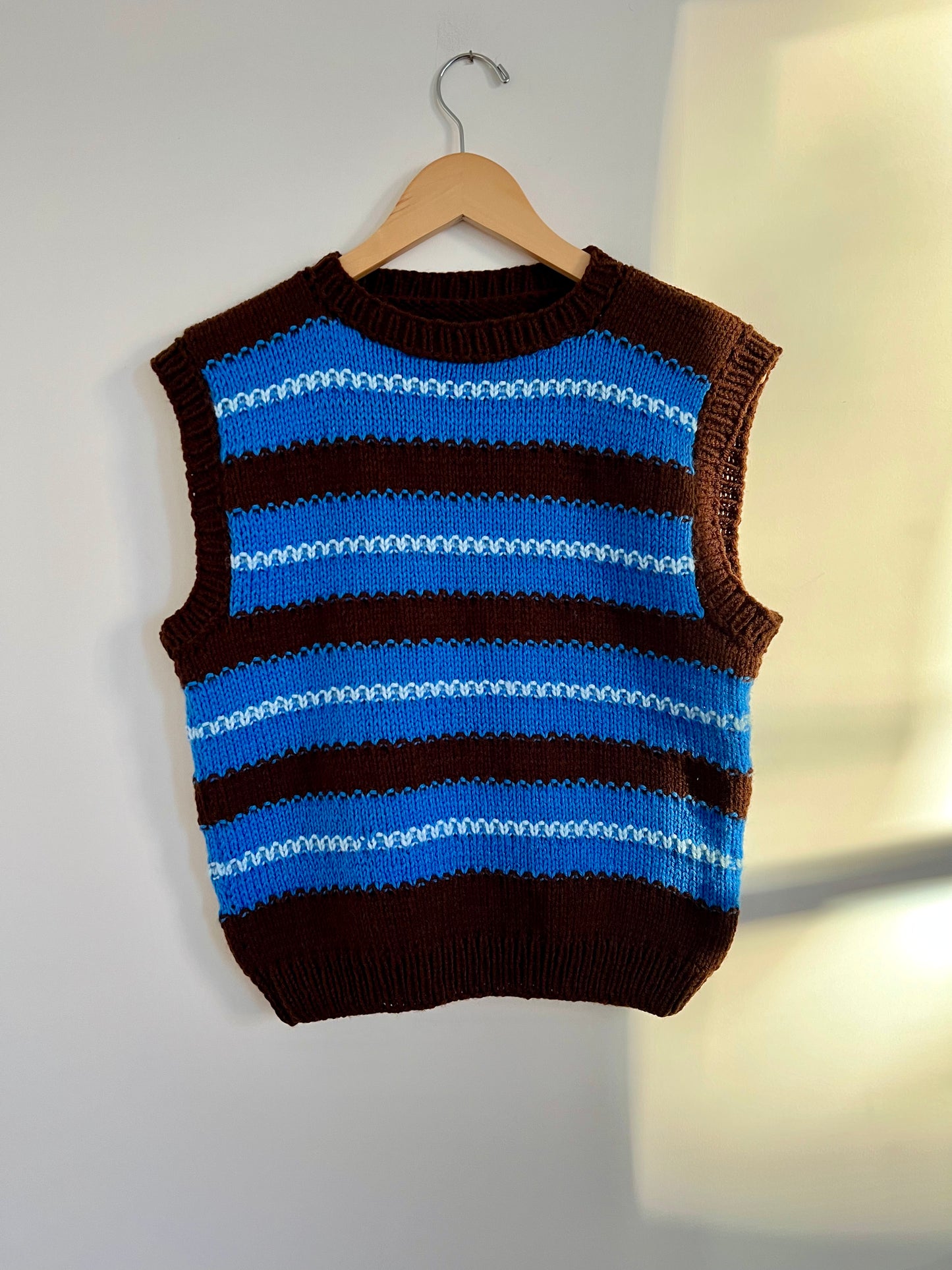 Hand knit vests by Upcycle