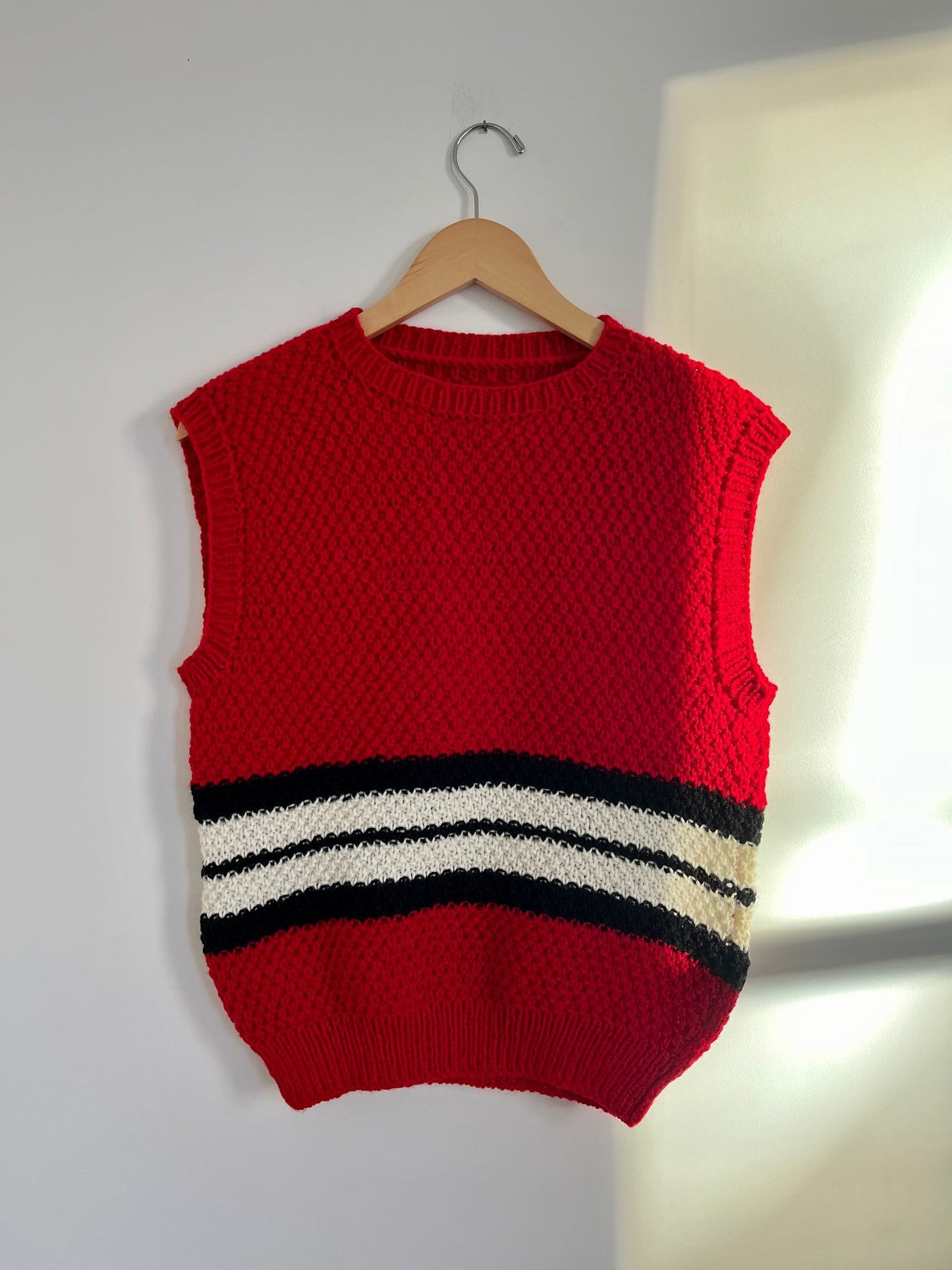 Hand knit vests by Upcycle