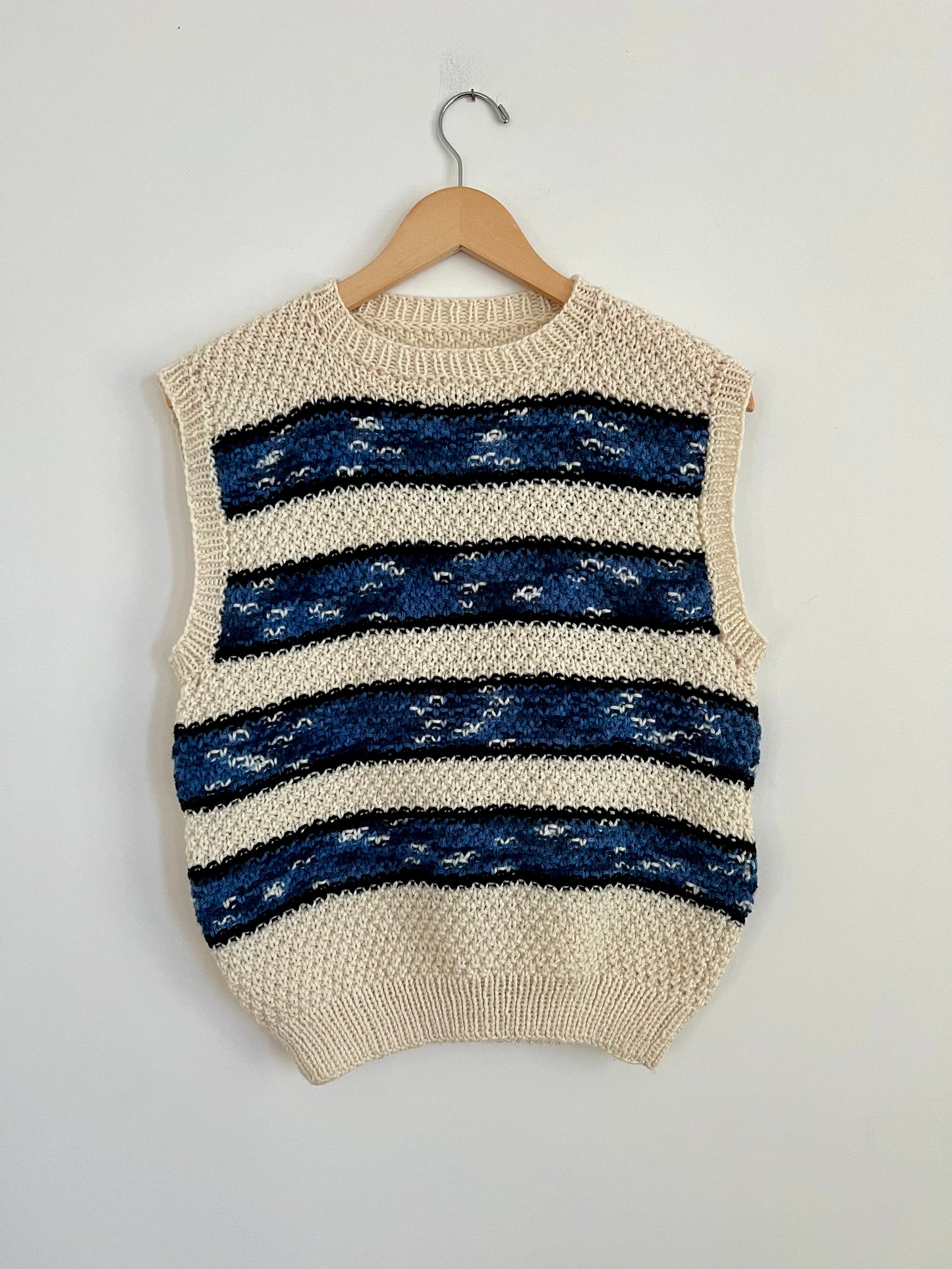 Hand knit vests by Upcycle