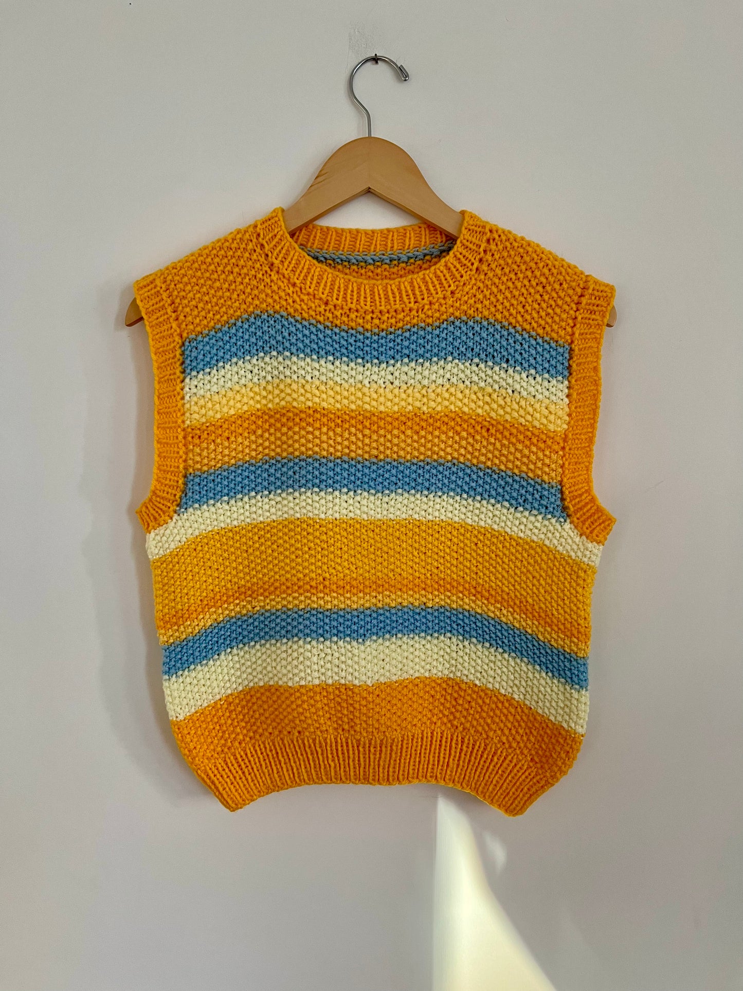 Hand knit vests by Upcycle