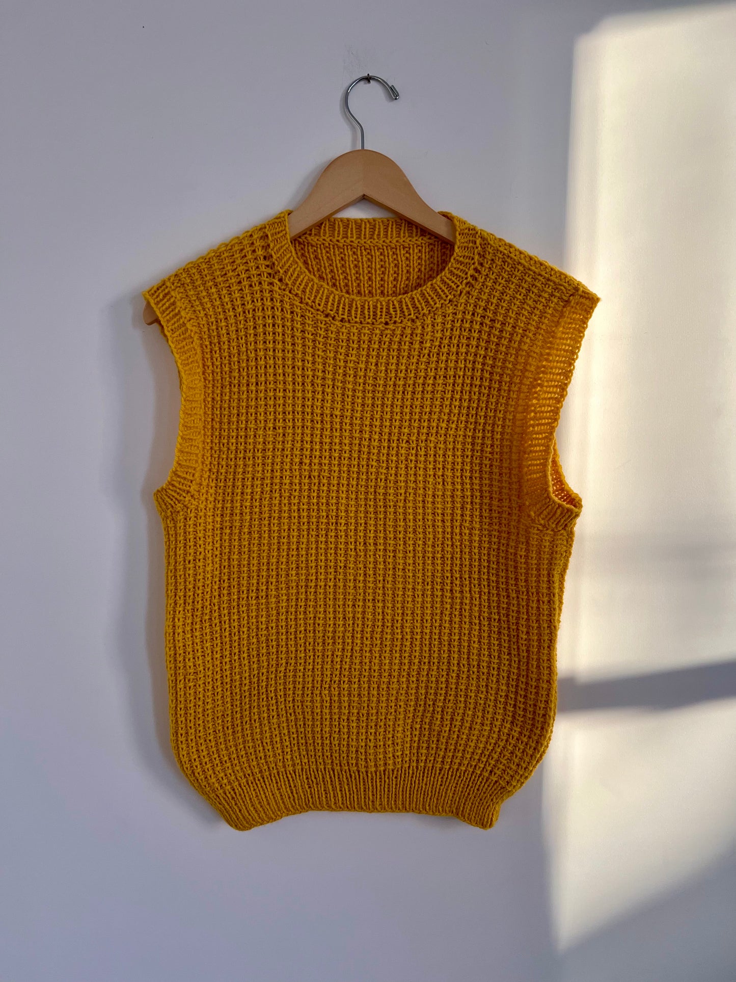 Hand knit vests by Upcycle