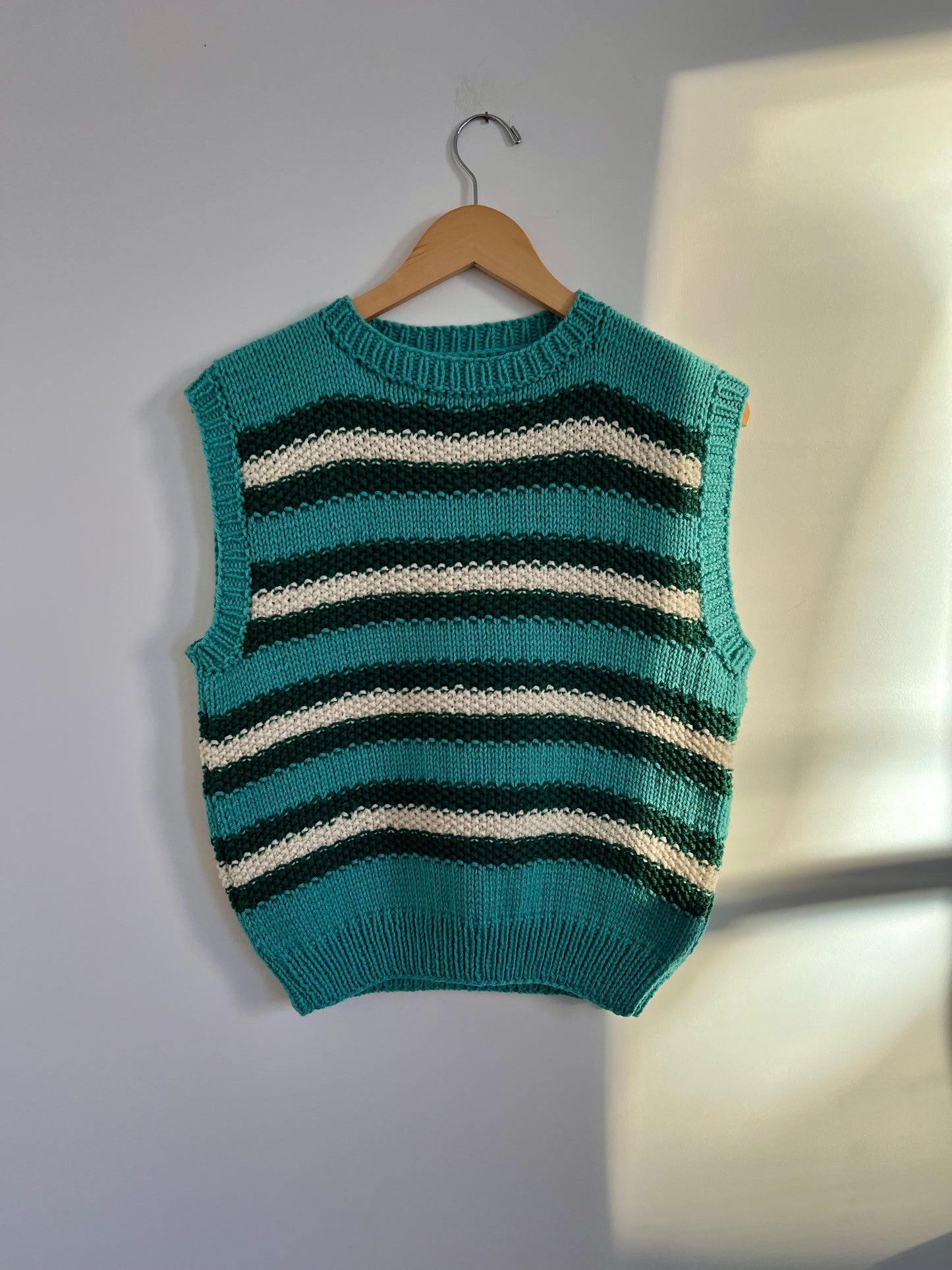 Hand knit vests by Upcycle