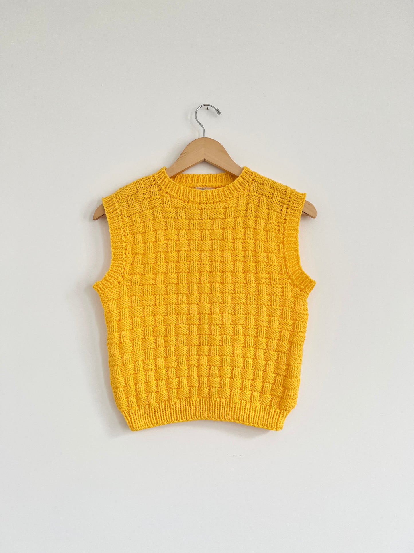 Hand knit vests by Upcycle