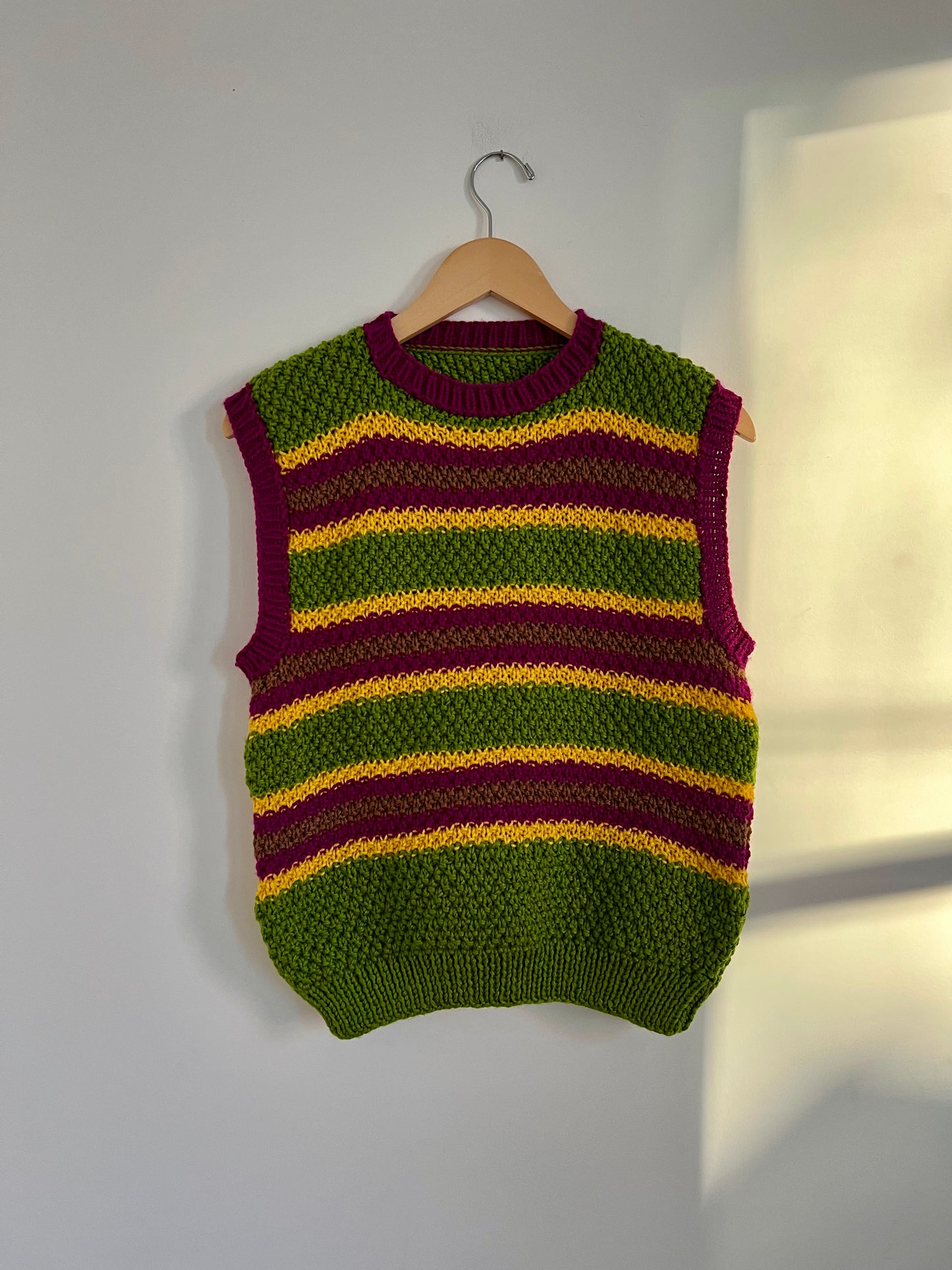 Hand knit vests by Upcycle