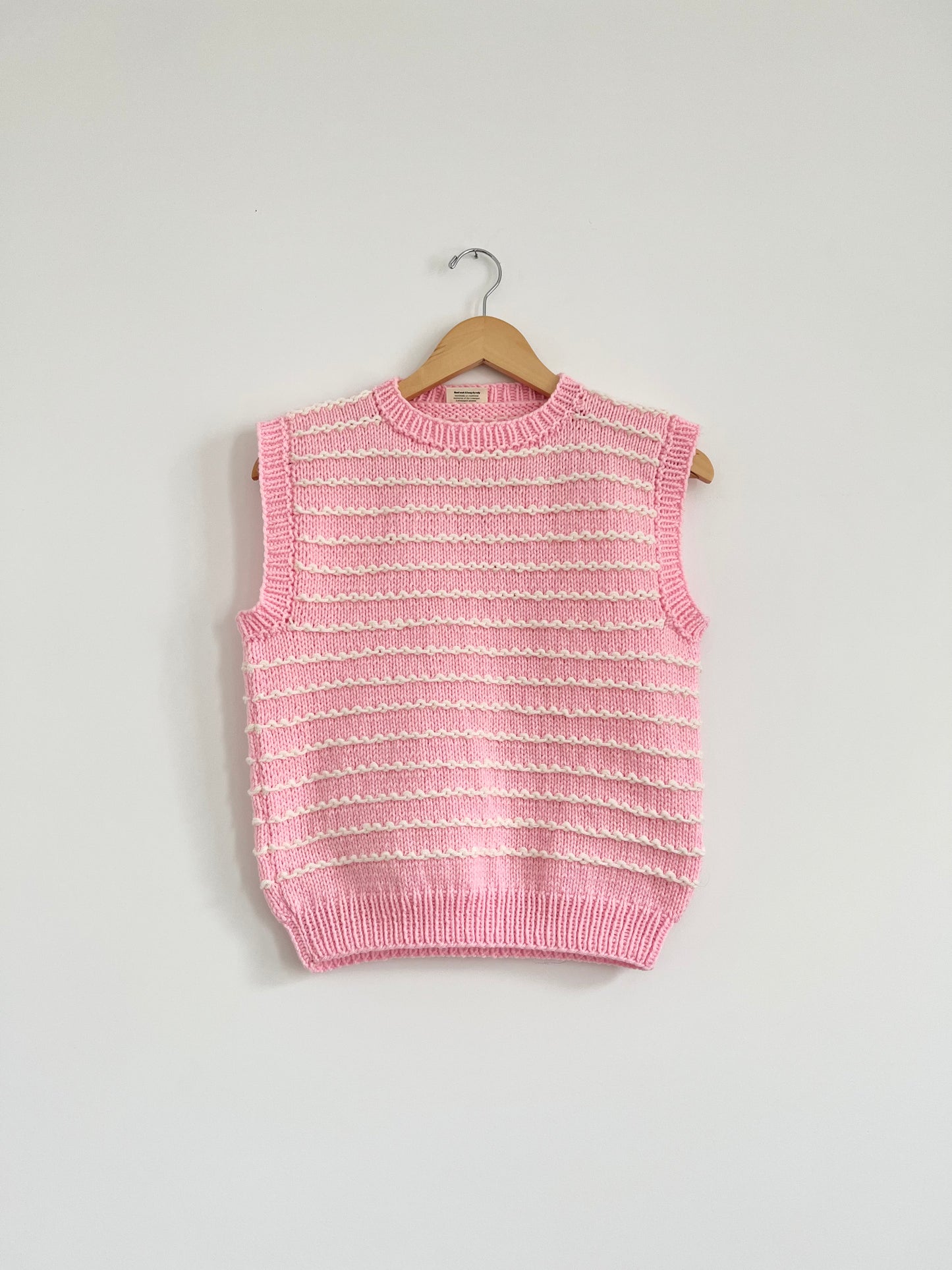 Hand knit vests by Upcycle